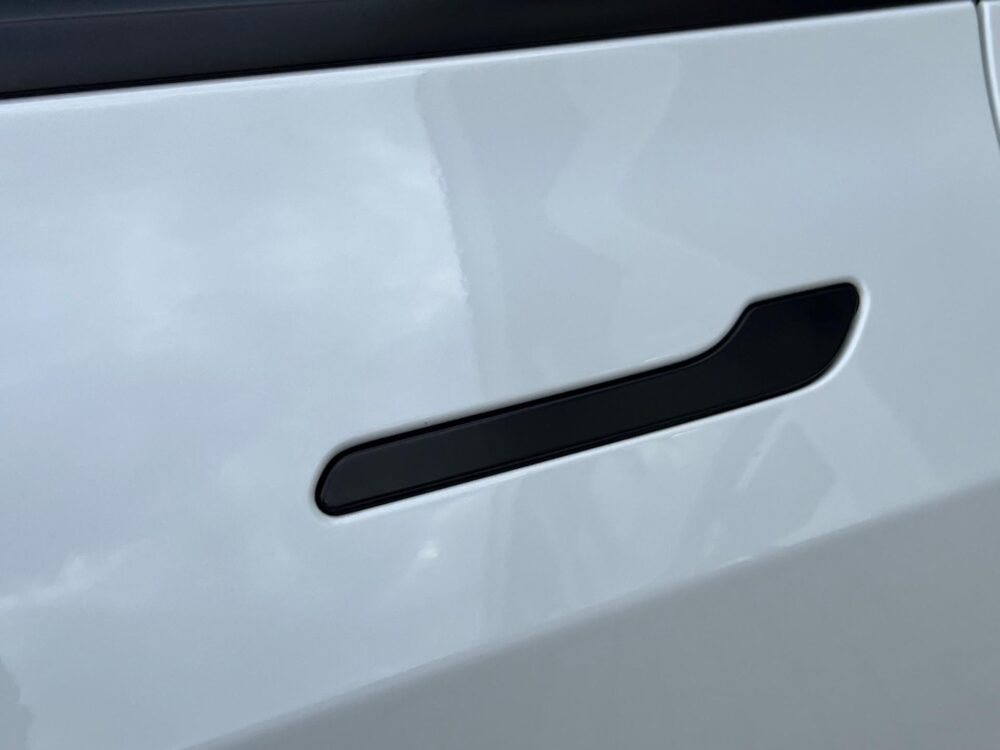 Tesla Model 3 Standard RWD Plus | | Camera | Keyless |