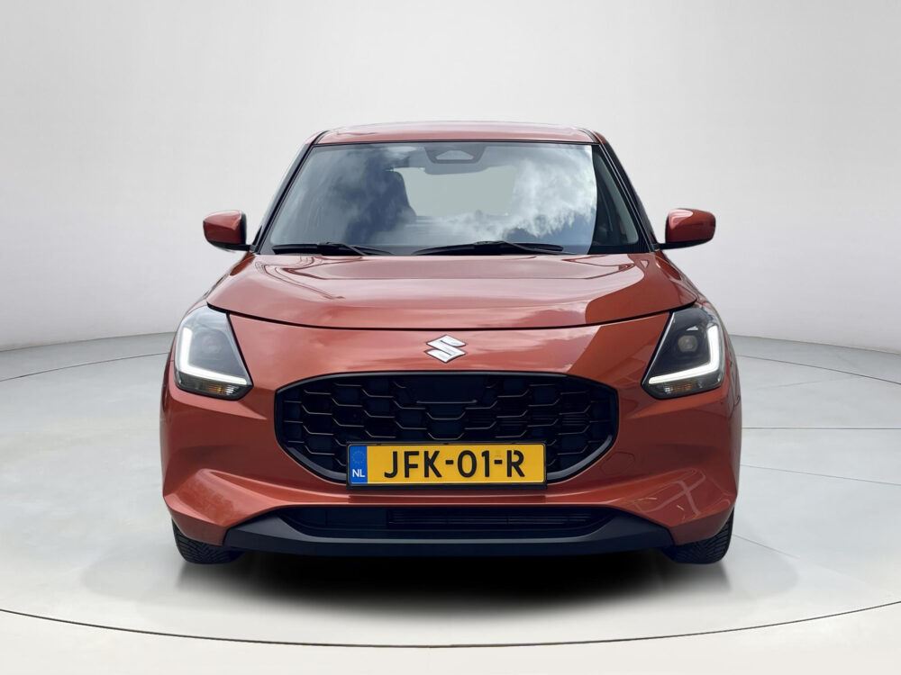 Suzuki Swift 1.2 Comfort Smart Hybrid Fabrieksgarantie tot 2035 | Navigatie | Cruise Control | 16′ LMV